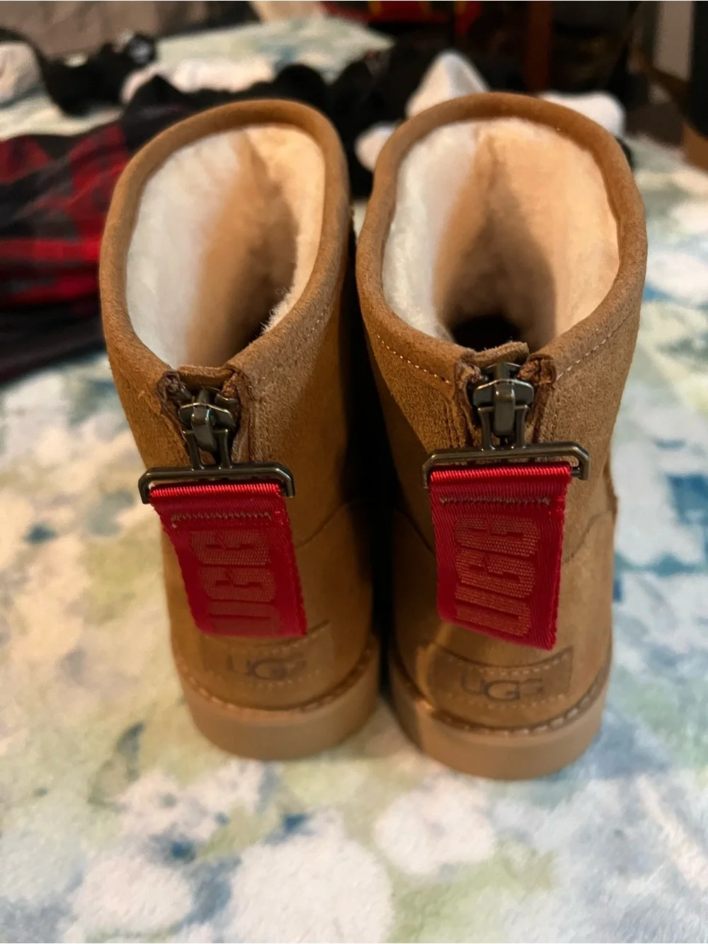 UGG mini Chestnut Suede Boots with Red Tag Zipper